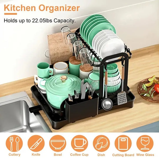Kitchen organizer with dishes on a countertop next to a sink