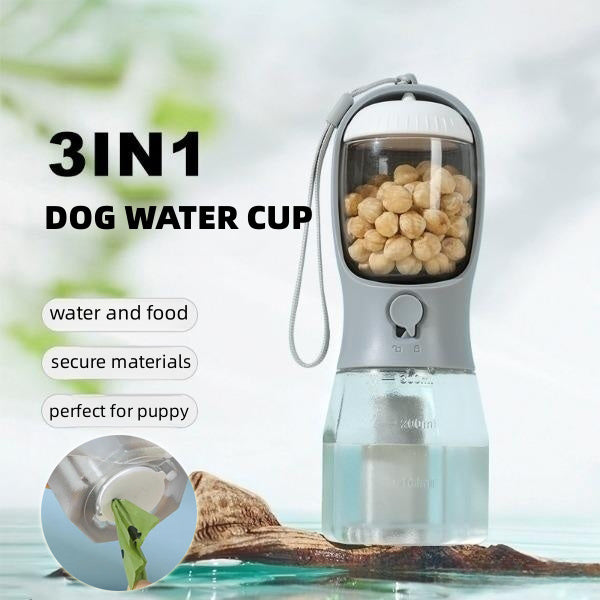 Travel-friendly pet water bottle with waste bag compartment open