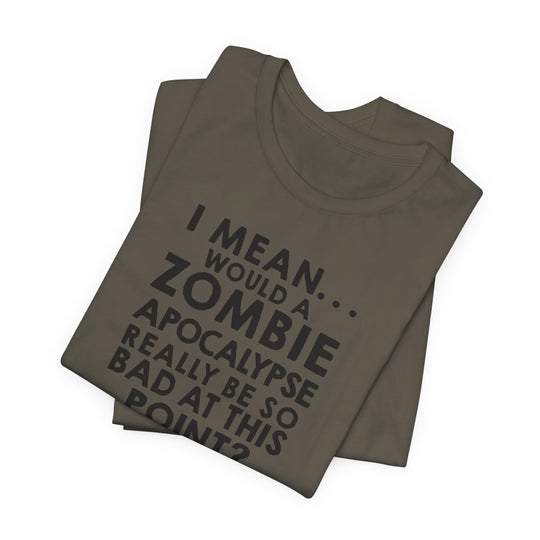 Stack of folded shirts with humorous text design on a white background