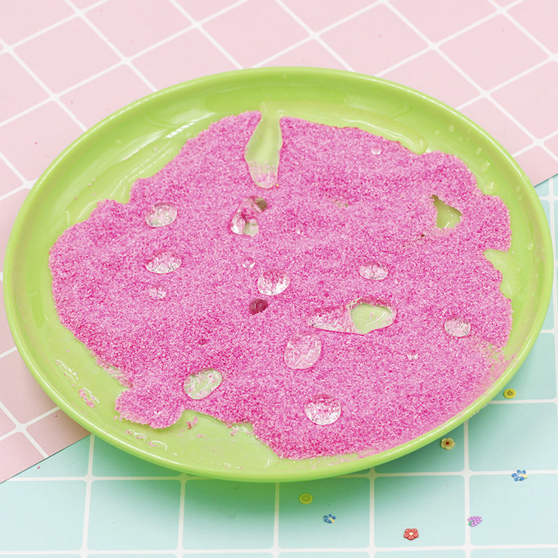Pink slime on a green plate with a pink and blue checkered background