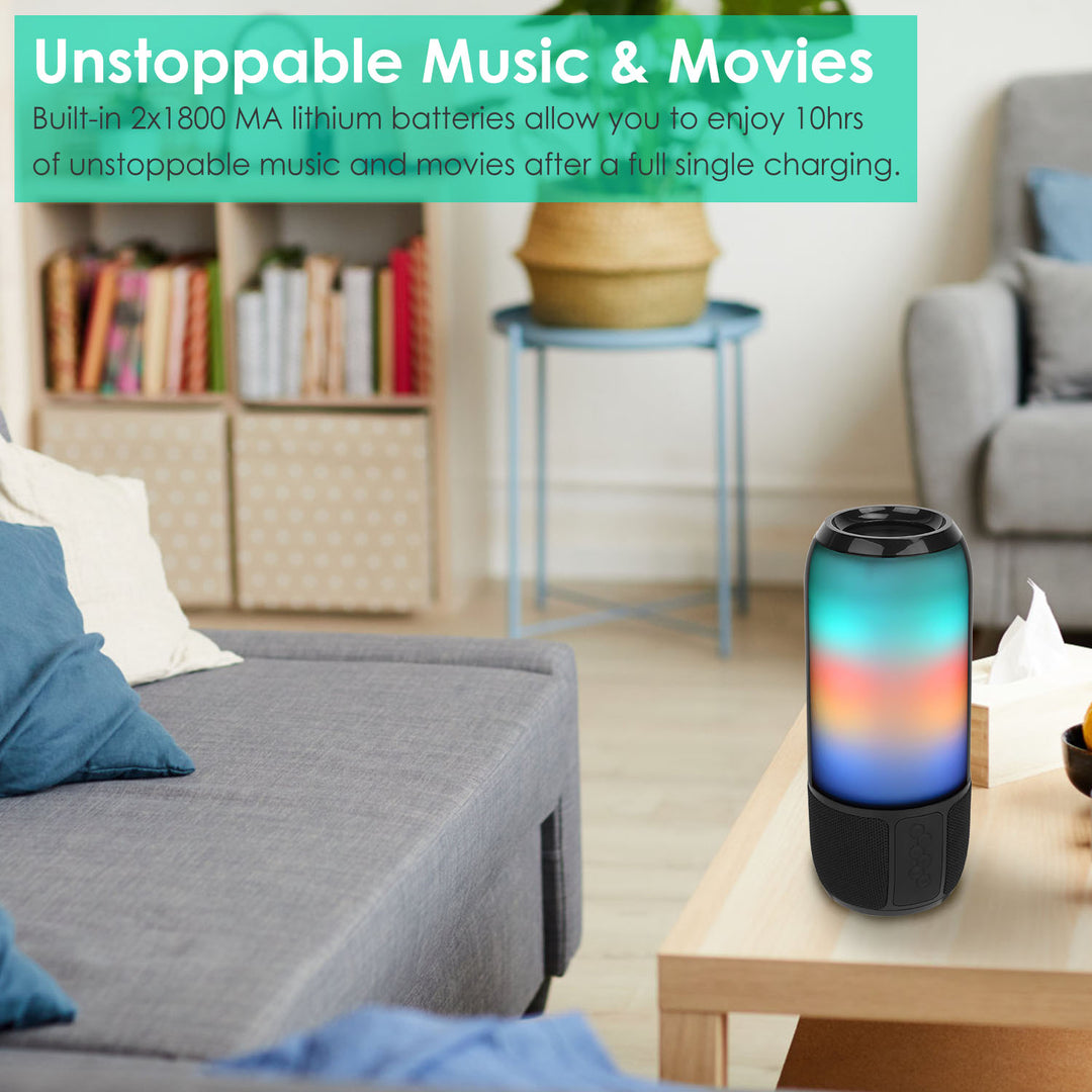 Colorful portable speaker on a coffee table in a living room with text about music and movies.