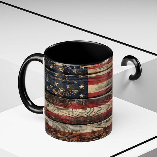 Black mug with American flag design on a white surface