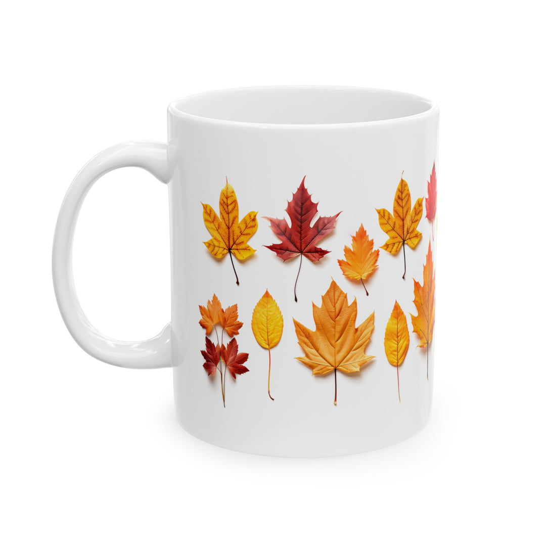 White mug with autumn leaf design on a white background