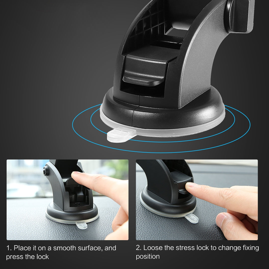 Car phone holder with suction cup and instructions on a dark background