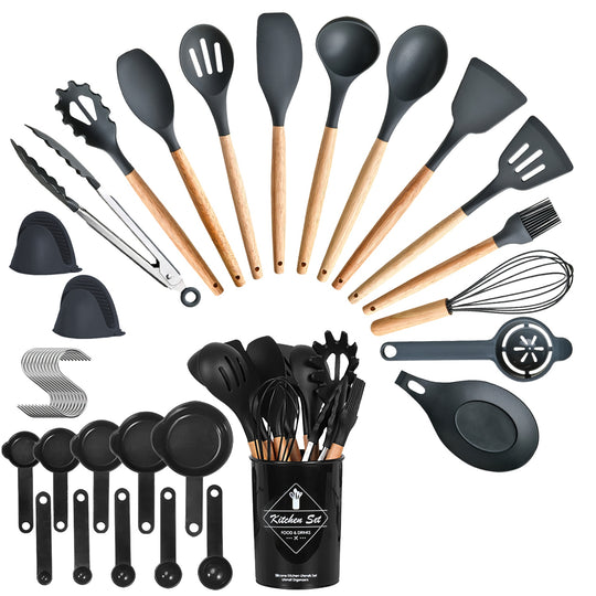 Set of kitchen utensils including spatulas, spoons, and whisks with a black container labeled &