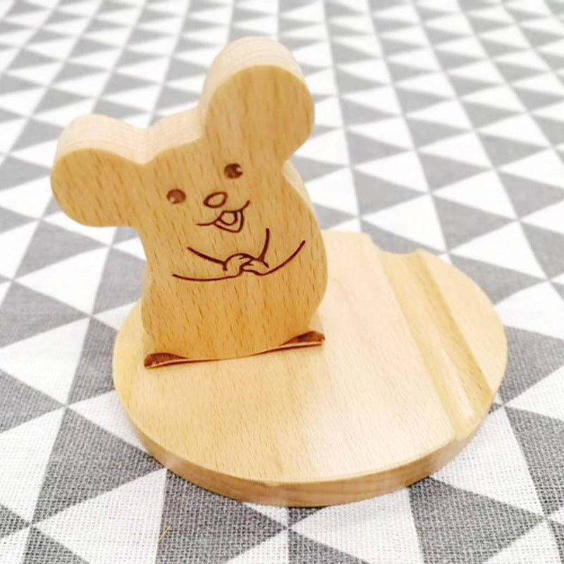 Wooden mouse stamp on a checkered background