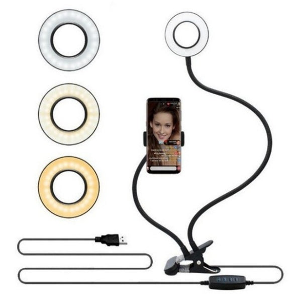 Set of selfie light ring, phone holder, and USB cable on a white background