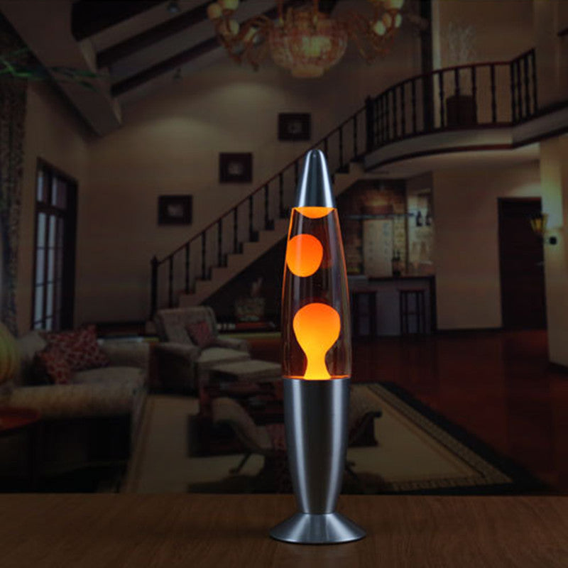 Lava lamp on a table in a dimly lit living room