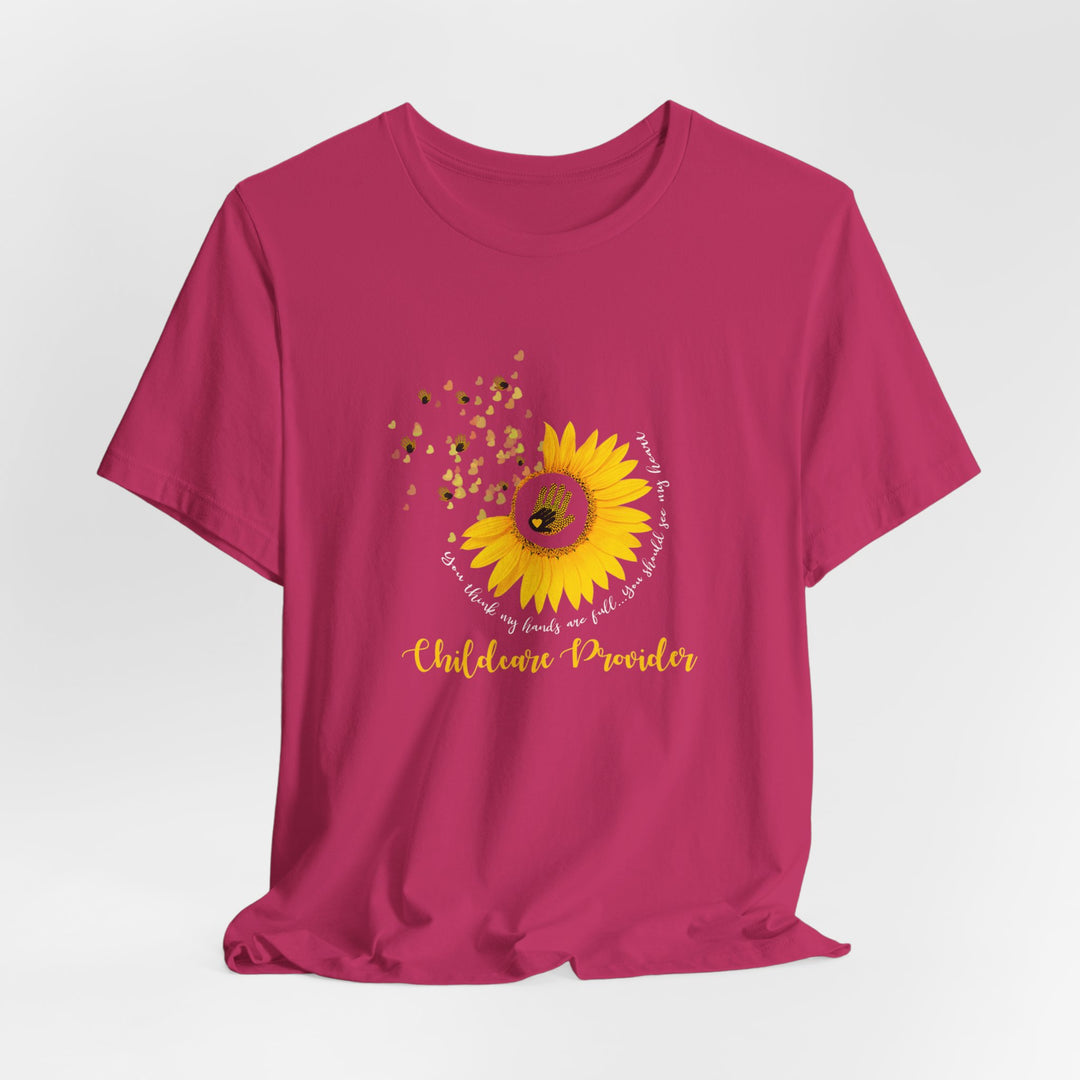 Pink t-shirt with a sunflower graphic and text on a white background