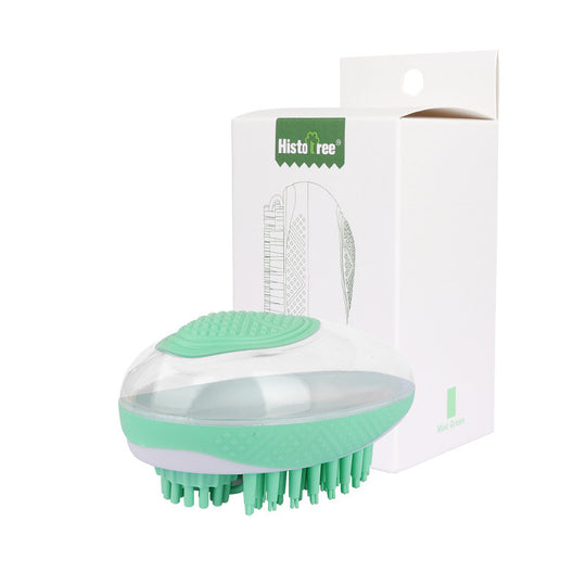 Green and white grooming brush with packaging on a white background