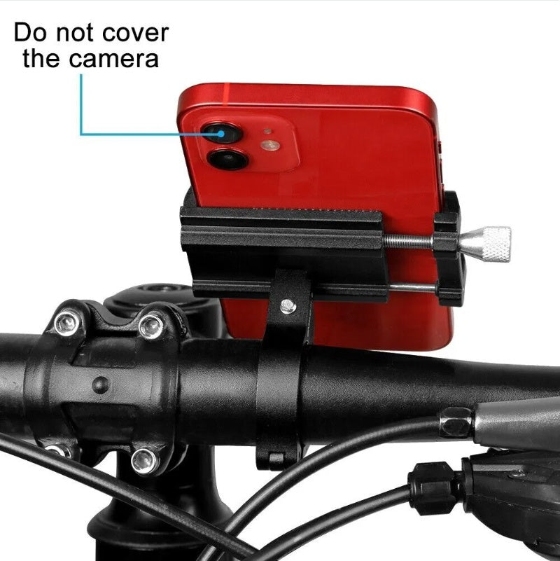 Red phone mounted on a black handlebar with a clear instruction not to cover the camera.