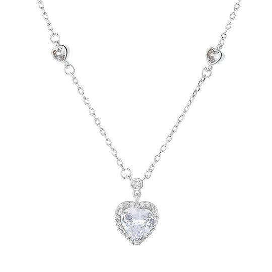 Heart-shaped crystal pendant necklace on a white background