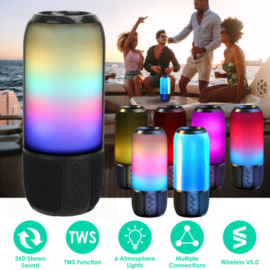Colorful Bluetooth speakers on a boat with people enjoying the sunset.