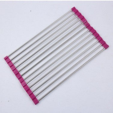 Metallic grill rack with pink handles on a white background
