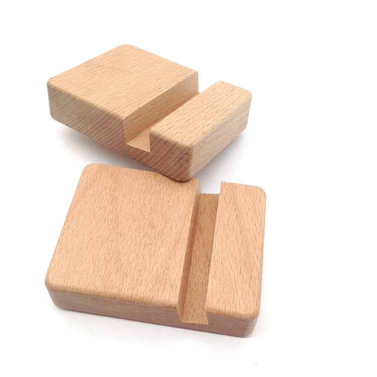 Two wooden geometric shapes on a white background