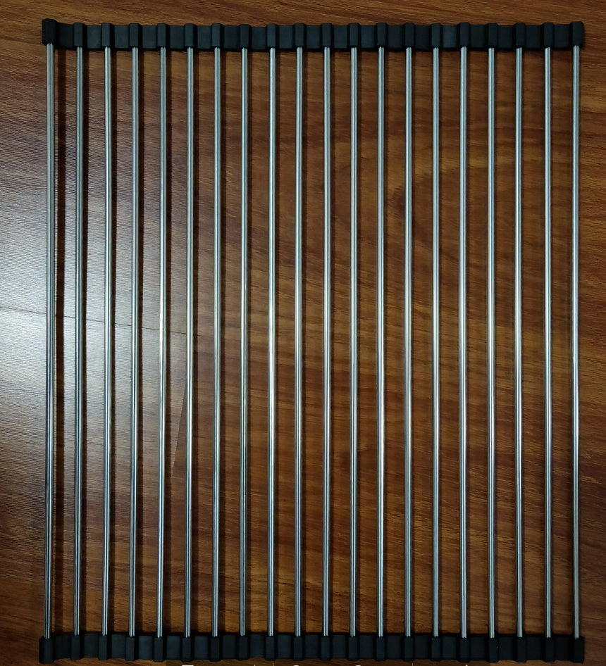 Metal grill rack on a wooden surface