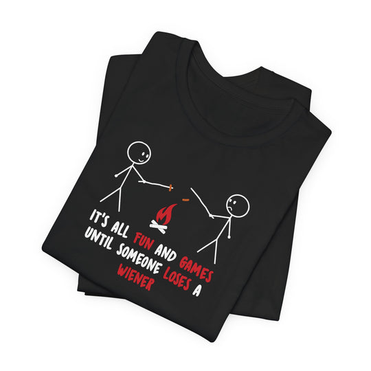 Black t-shirt with stick figure design and humorous text on a white background