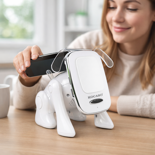 Woman using a smartphone with a white dog-shaped device on a wooden table.