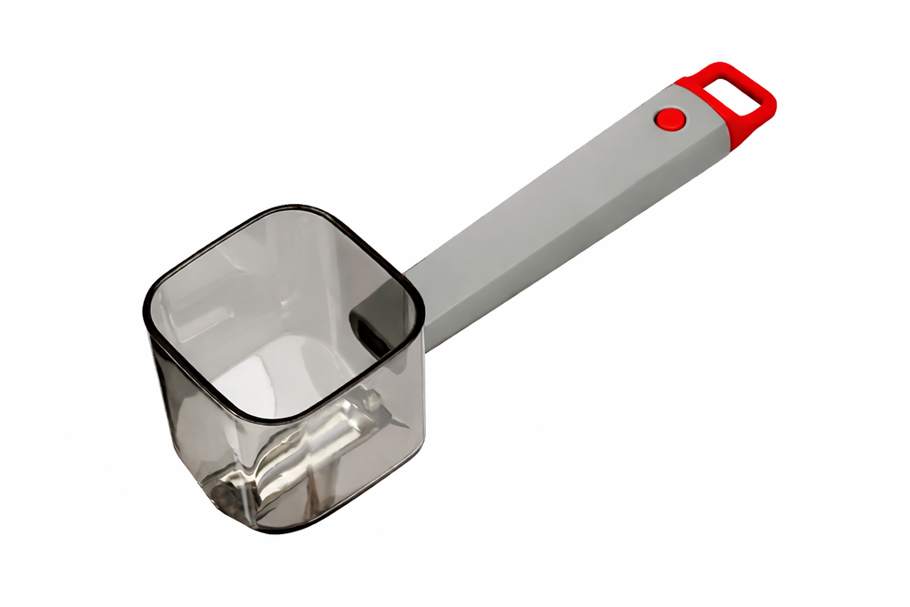 Stainless steel peeler with red accents