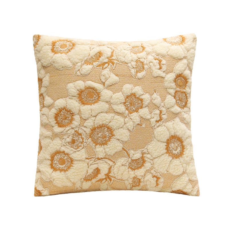 Decorative pillow with floral pattern on a white background