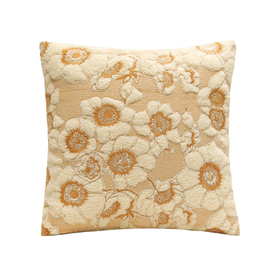 Decorative pillow with floral pattern on a white background