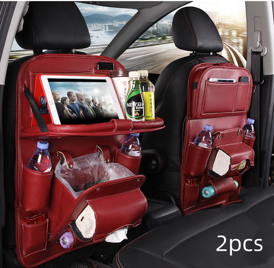 Red car seat back organizers with multiple pockets and a tablet stand, placed inside a vehicle.