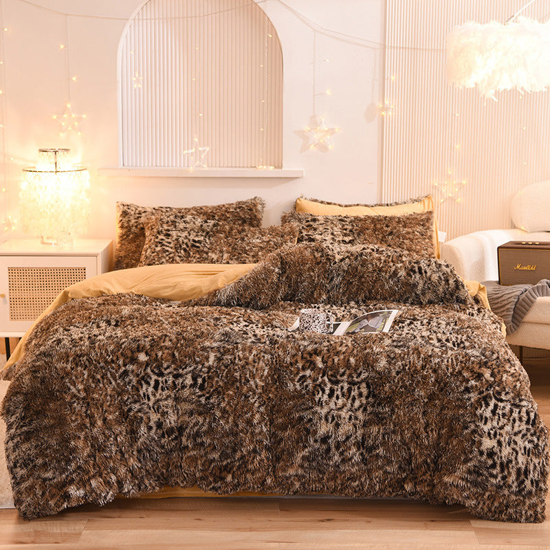 Leopard print comforter set on a bed in a bedroom with decorative lights.
