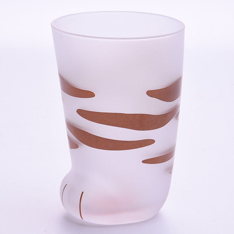 Frosted glass tumbler with brown tiger stripe design on a white background