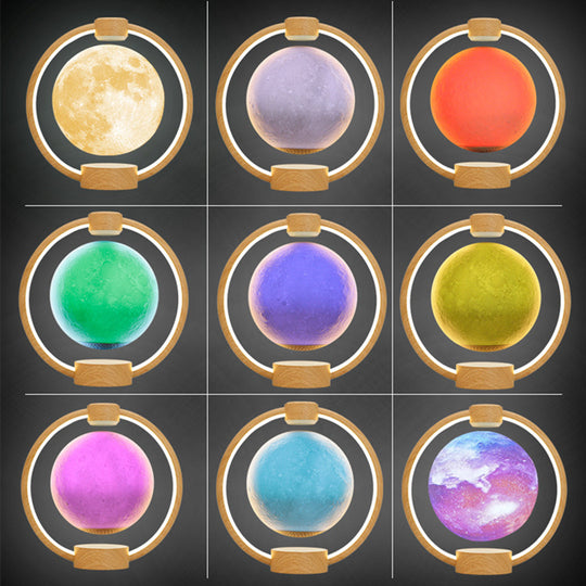 Nine colorful spherical lights in a grid on a dark background
