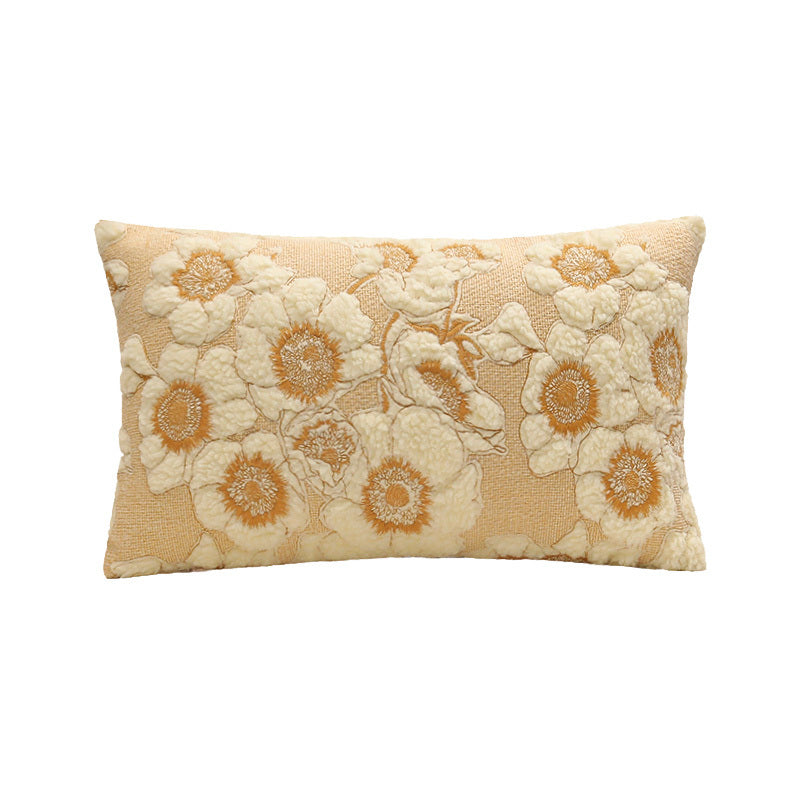 Decorative pillow with floral pattern on a beige background