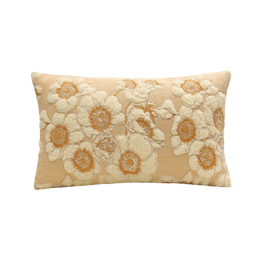Decorative pillow with floral pattern on a beige background