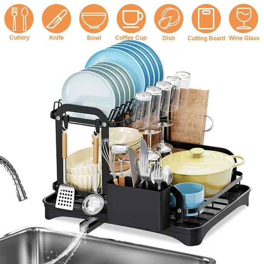 Dish drying rack with various dishes and utensils next to a sink, with icons and labels above.
