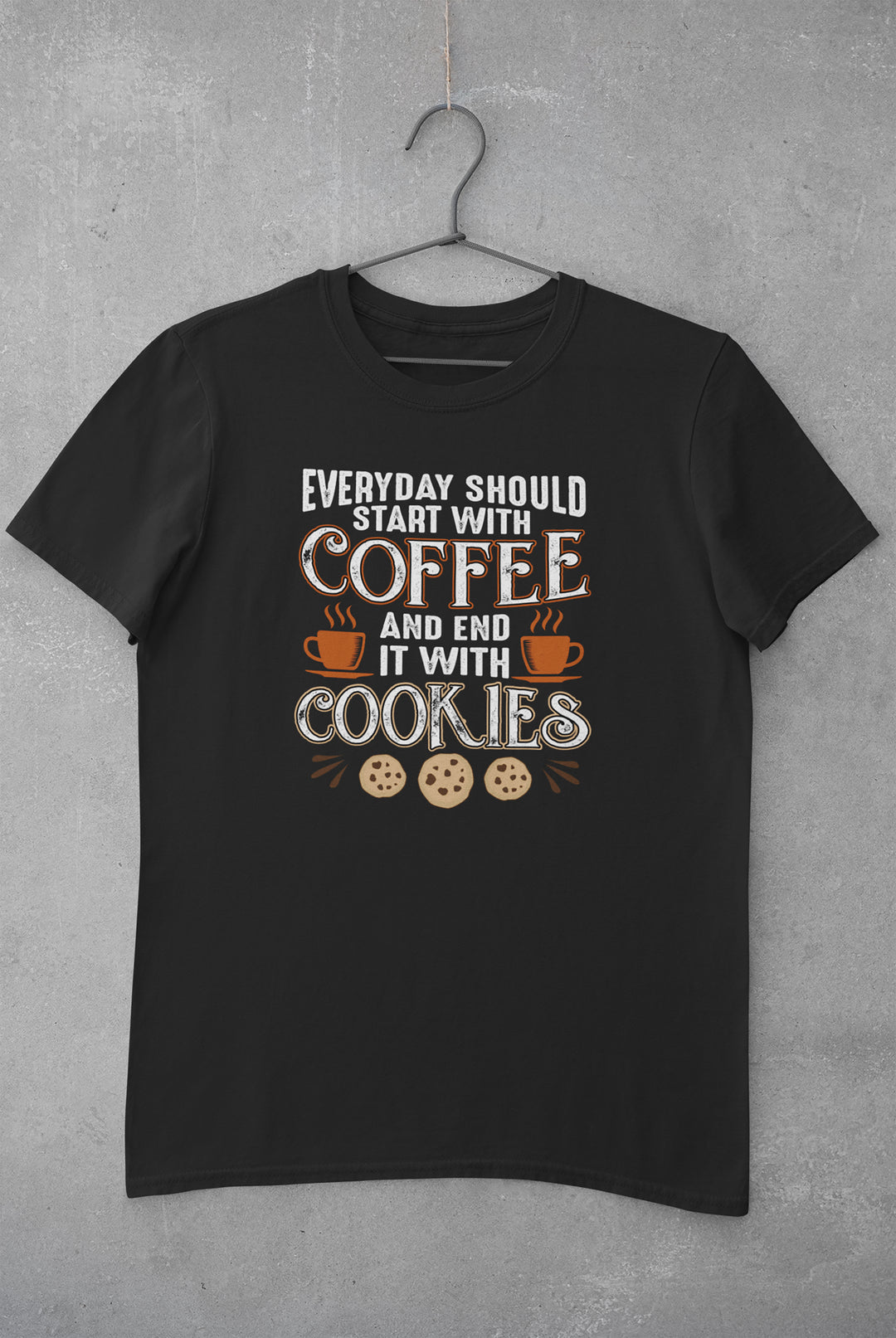 Black t-shirt with text and graphics on a gray background